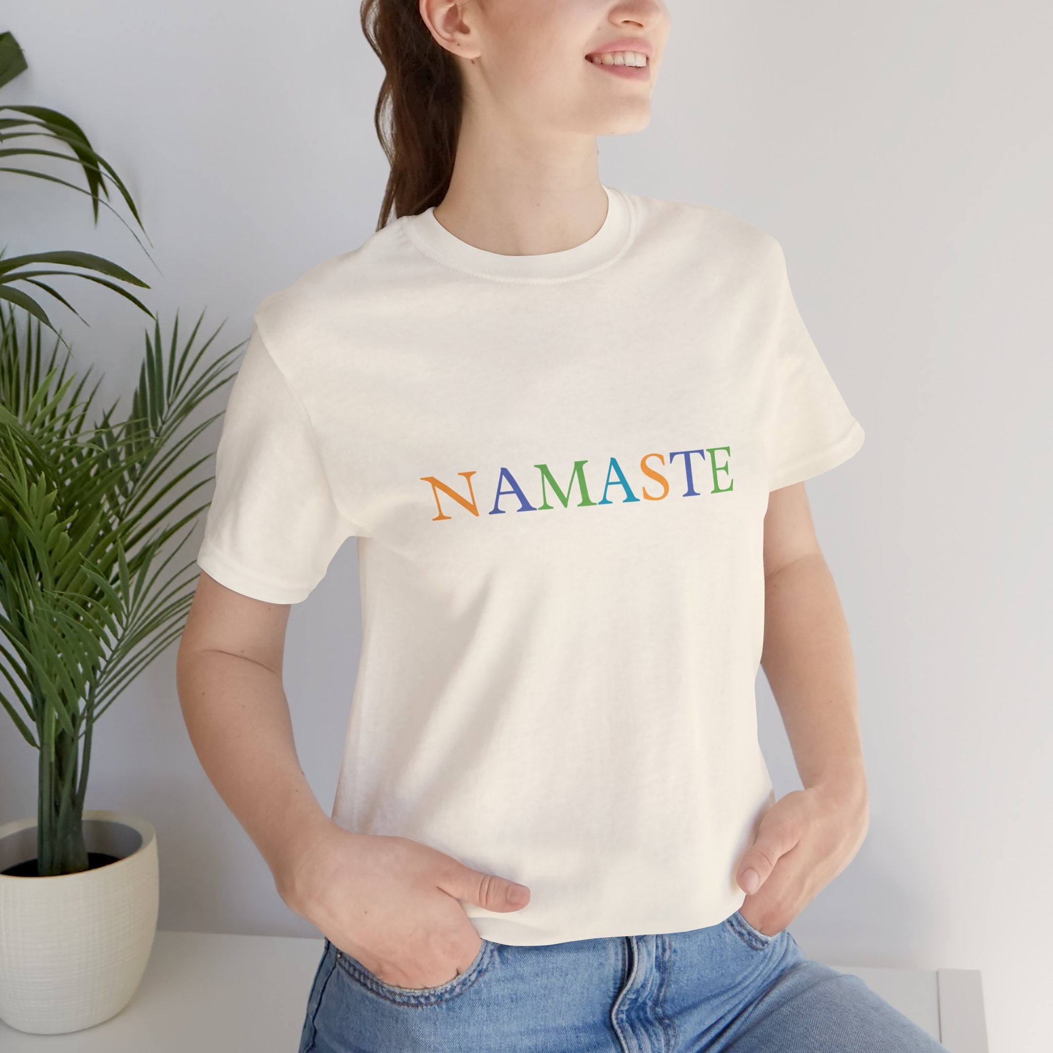เสื้อยืดคอกลม NAMASTE สำหรับผู้ชายและผู้หญิง Tramunquiero